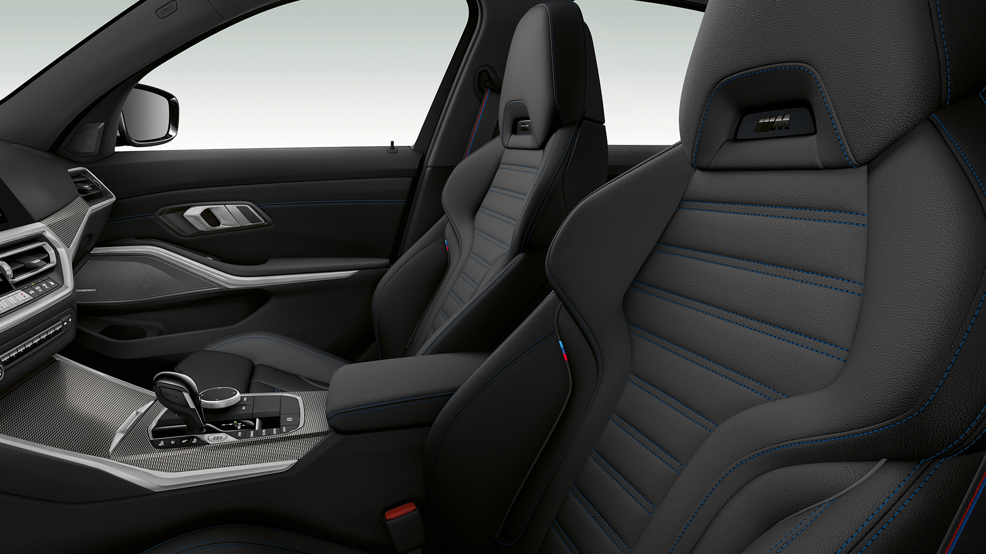 BMW Serie 3, Acabado M Sport: asientos delanteros G20 Detalle del lateral de los asientos delanteros del BMW Serie 3 con equipamiento del Acabado M Sport G20.
