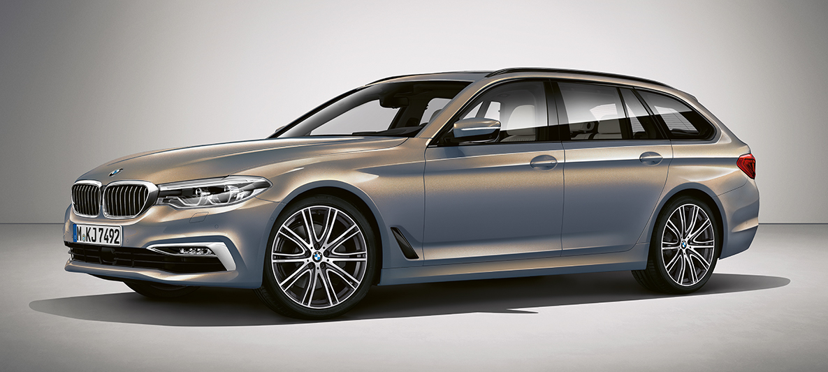 BMW Individual BMW Serie 5 Touring BMW Individual BMW Serie 5 Touring G31 Champagne Quarz metalizado, vista de tres cuartos del lateral