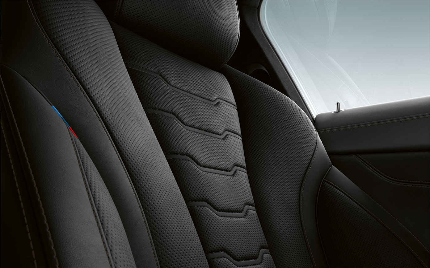 BMW Serie 8 Coupé, tapicería. Detalle de la tapicería y las costuras del BMW Serie 8 Coupé.