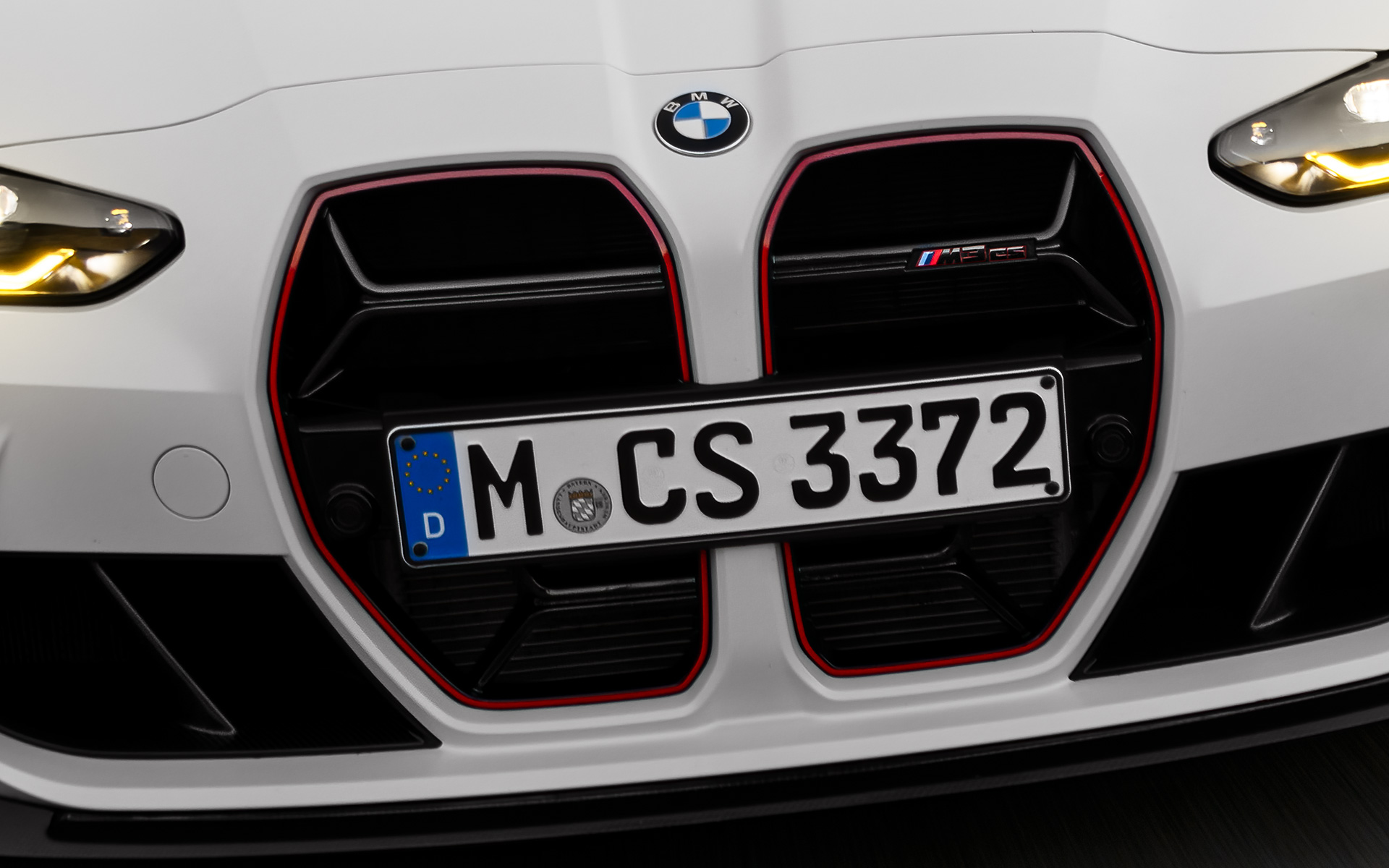Parrilla específica de CS en Black con firma roja de modelo especial BMW M3 CS G80 BMW M3 CS G80 Parrilla específica de CS en Black con firma roja de modelo especial, vista del frontal, en marcha