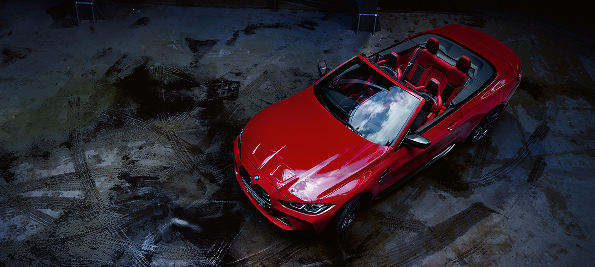BMW Individual Imolarot metalizado BMW M4 Competition Cabrio con sistema M xDrive G83 2021 BMW M4 Competition Cabrio con sistema M xDrive G83 2021 BMW Individual Imolarot metalizado, vista de tres cuartos del frontal desde arriba con capota abierta