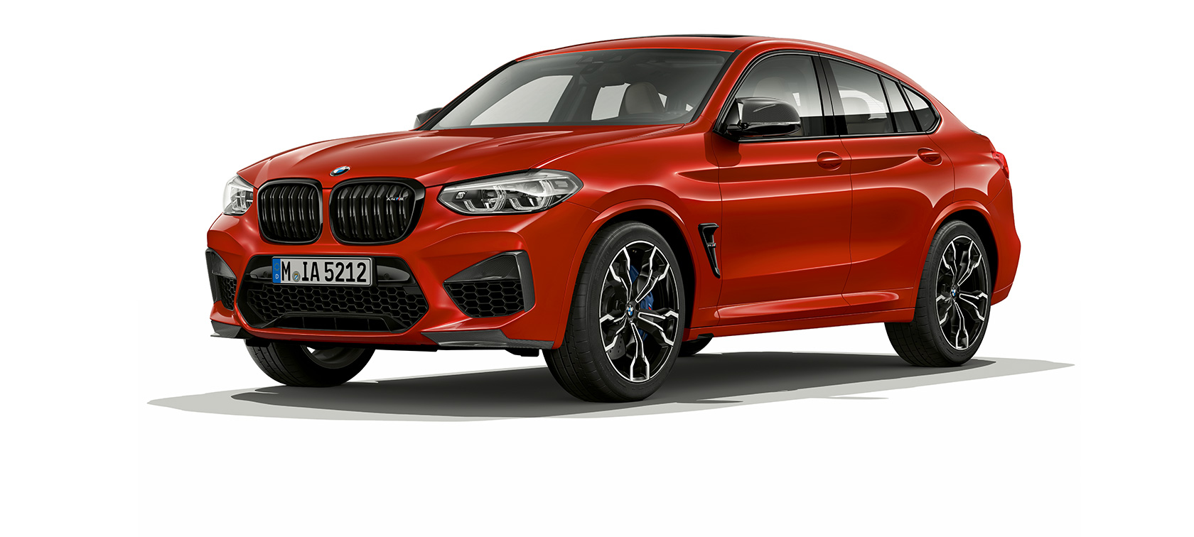 BMW X4 M Competition, vista de tres cuartos del lateral BMW X4 M Competition en Toronto Rot metalizado, exterior, vista de tres cuartos del lateral