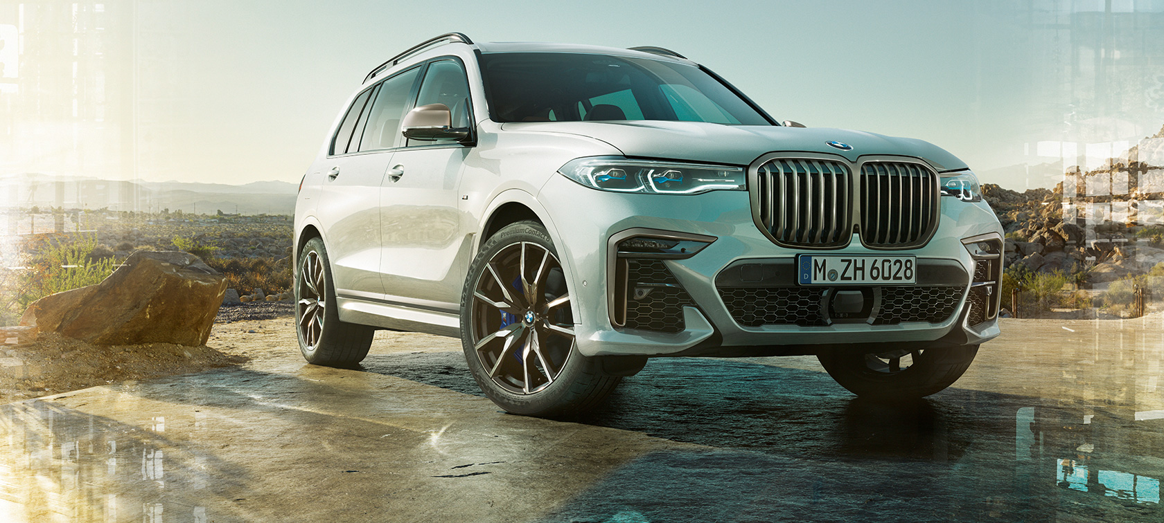 Gama BMW X7 M G07 2019 vista de tres cuartos del frontal Gama BMW X7 M G07 2019 Mineral White, vista de tres cuartos del frontal, parado