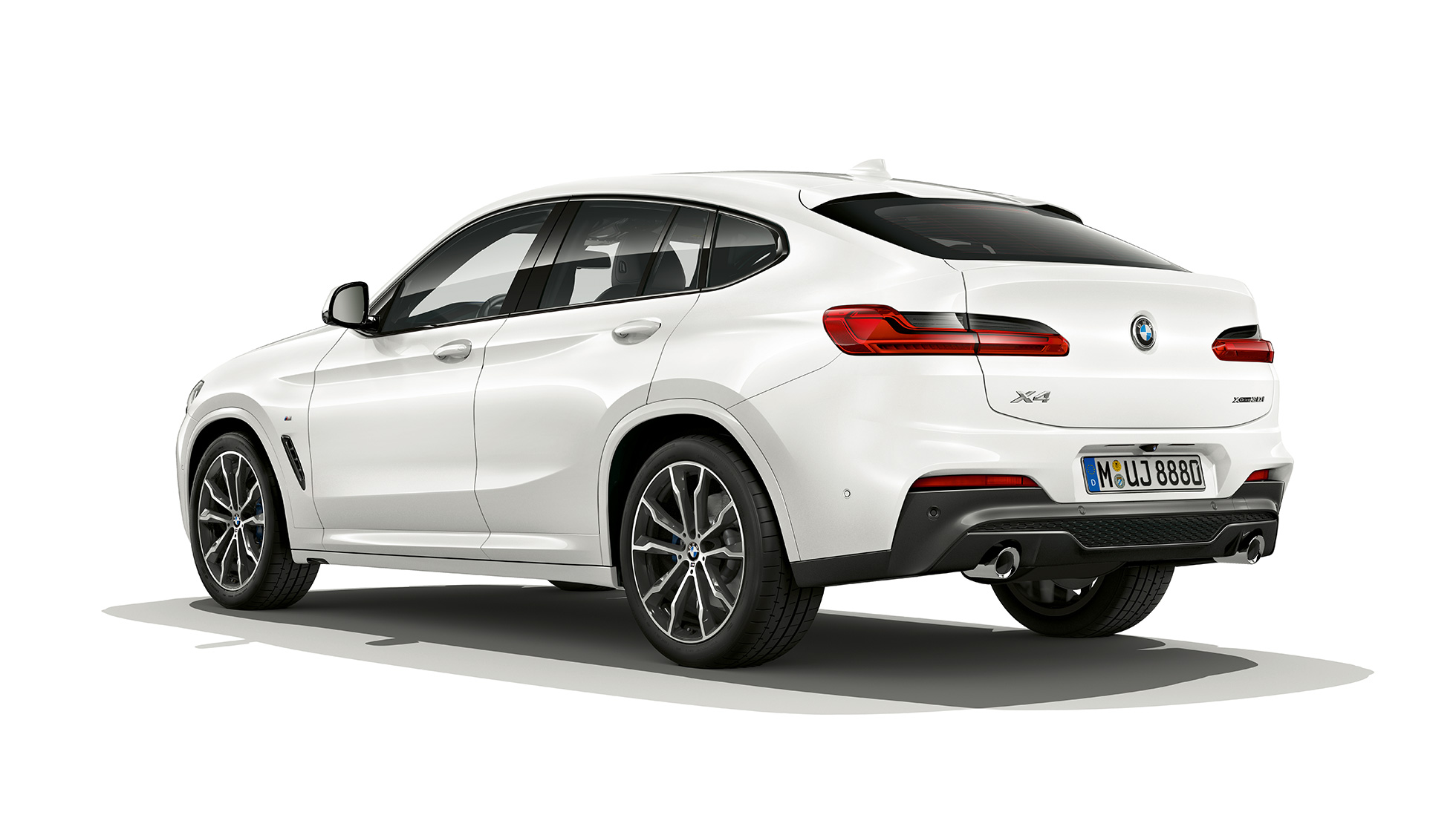 Vista de tres cuartos de la zaga BMW X4 SUV G02 Acabado M Sport BMW X4 xDrive30i SUV Acabado M Sport G02 en color Alpinweiss, vista de tres cuartos de la zaga del todoterreno coupé
