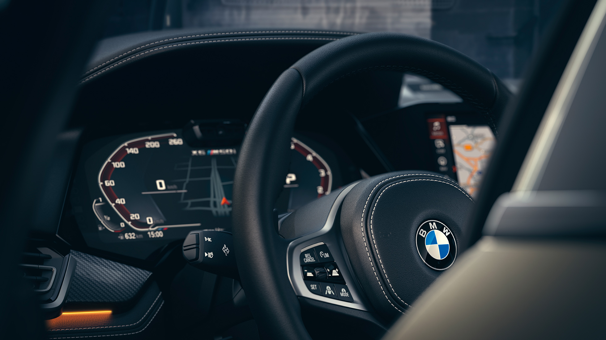Sistemas de asistencia BMW. Detalle del interior del BMW, centrado en el cuadro de instrumentos.